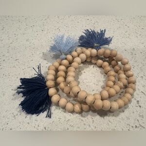 Wooden Bead Bracelet Stack with Blue Tassels